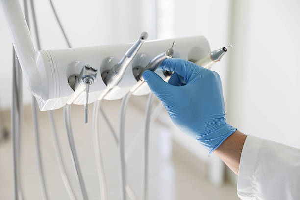 Professional Tooth Extraction technician working in Rowan County County, NC